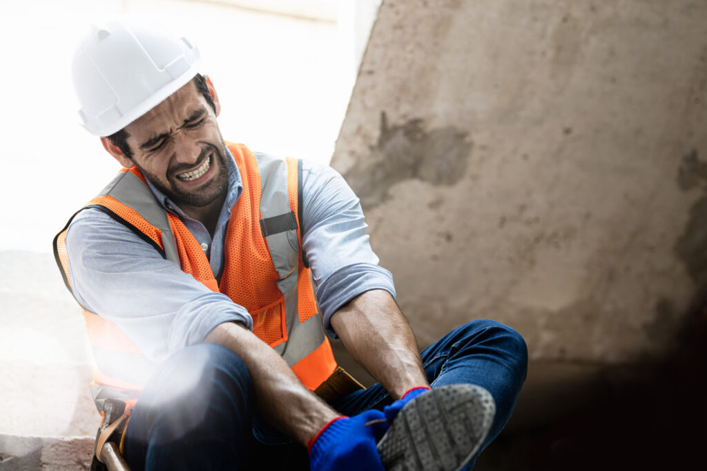 Handsome engineer injured his ankle when he stepped on a nail